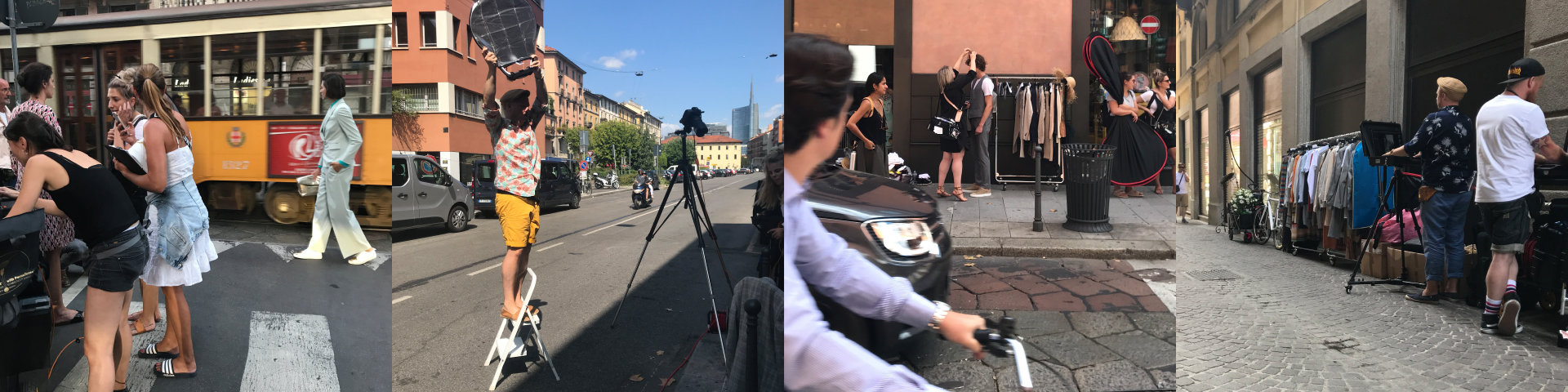 Hinter den Kulissen eines Fotoshootings mit Team, Modellen, Kameras und Kleidung auf der Straße.